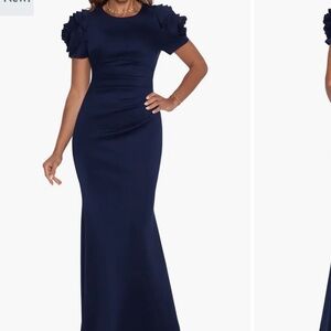 Size 16 dress. Escape.  Floral sleeve accent. Stretchy and comfortable